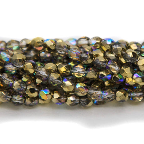 3FC512-GR: Czech Faceted Round Crystal Golden AB 3mm 100 Pieces