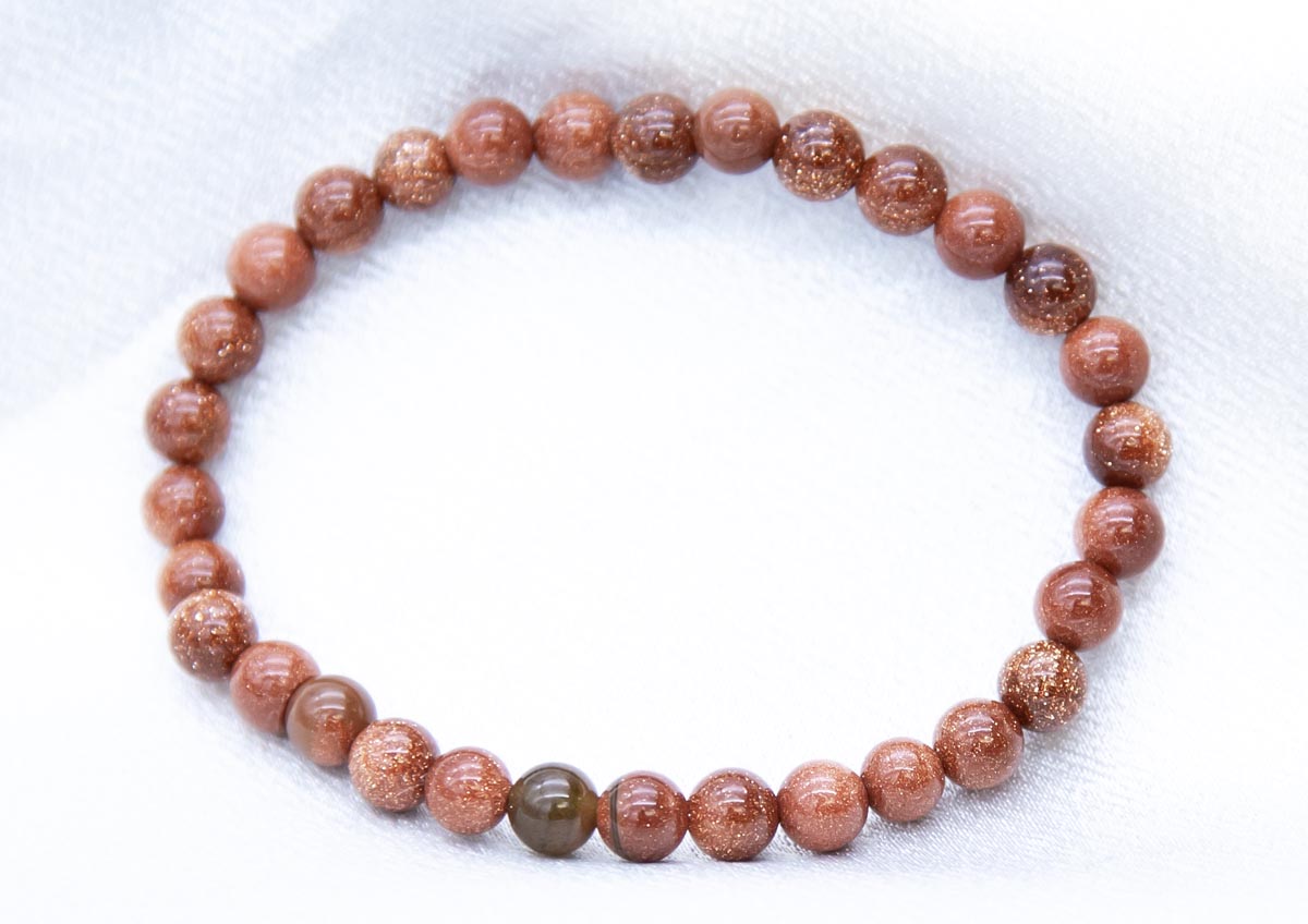 ST444-BR: Red Goldstone Stretch Bracelet 6mm