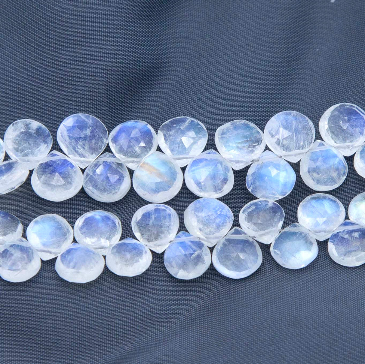 42ST185-RBW1: Rainbow Moonstone "AA" FC Briollette DP 6-8mm 64-75CT