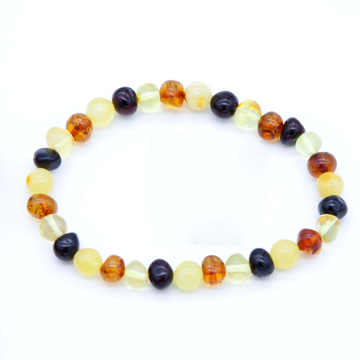 1AC925-B7: Amber Stretch Bracelet Rd Nuggets Mixed