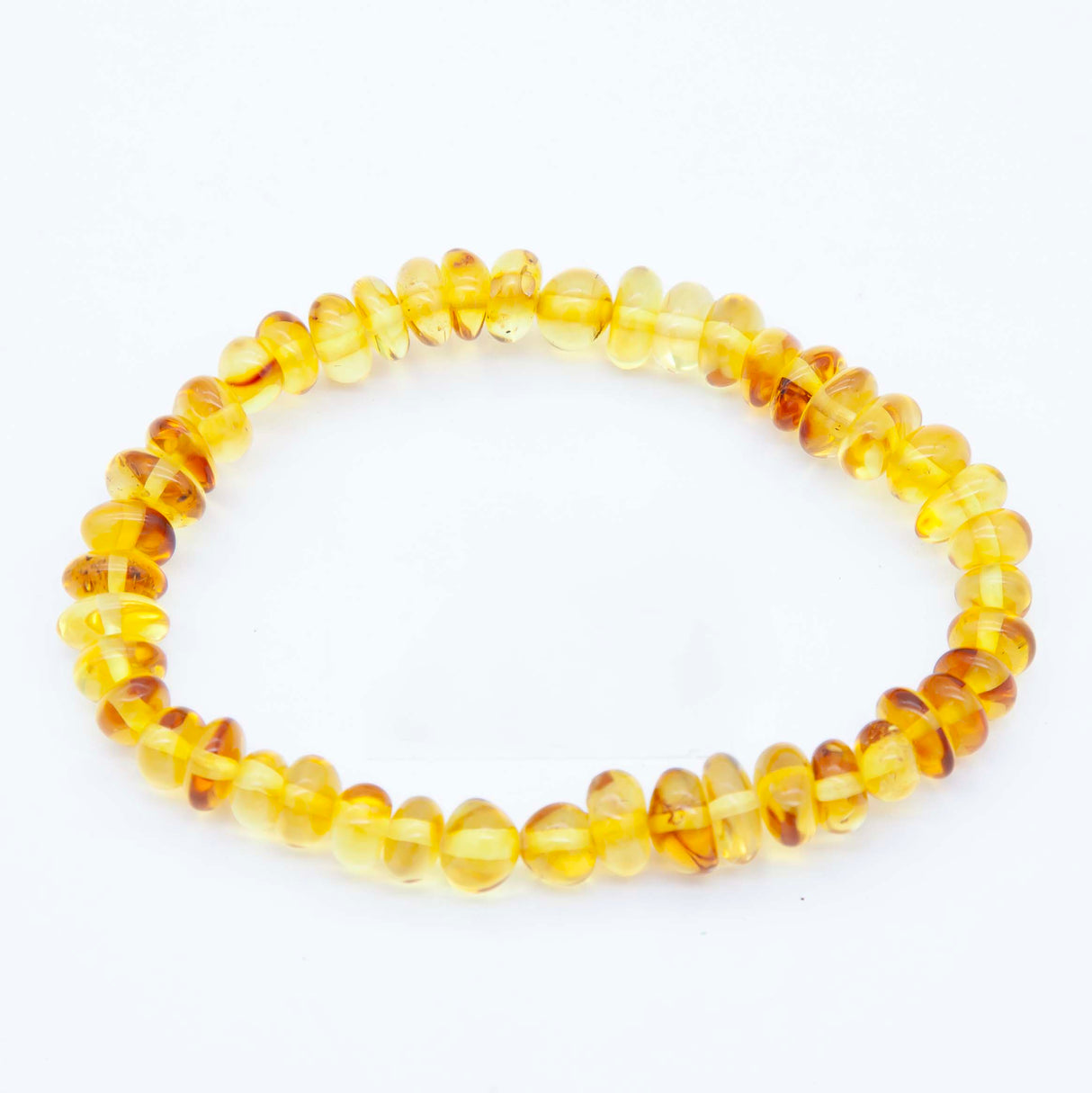 1AC925-B2: Amber Stretch Bracelet Sm Nuggets Lt Honey