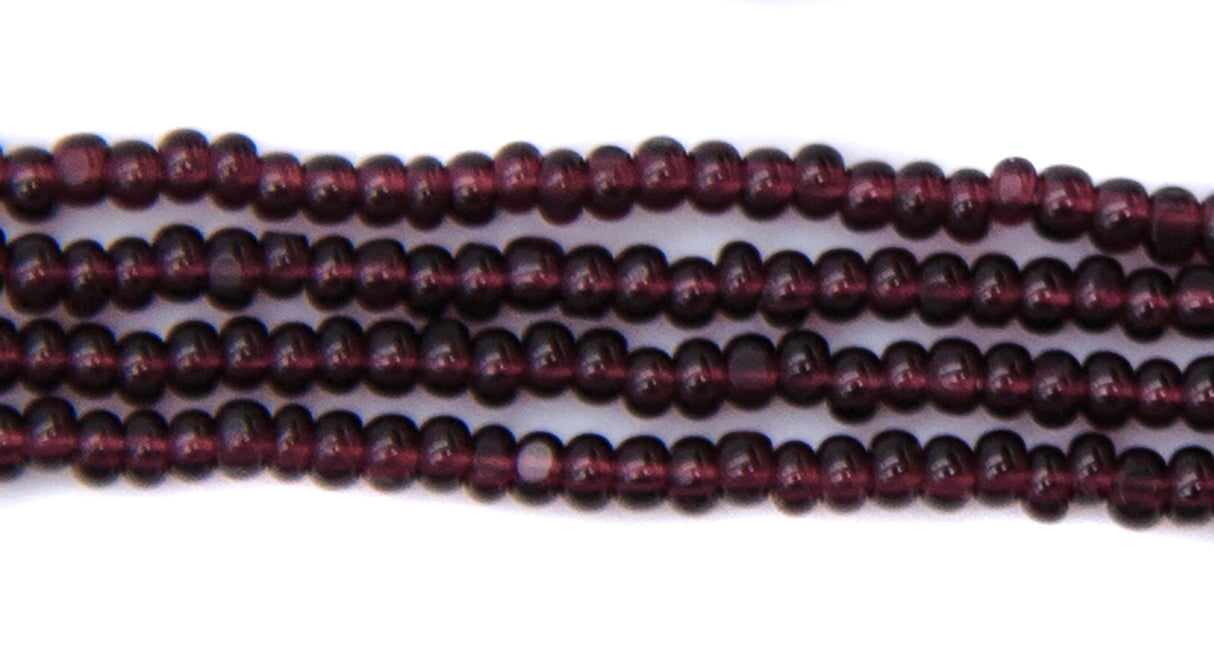 13SB299-CR: Czech Seed Bead Charlotte True Cut Tr Dark Amethyst 13/0 - 1 Hank