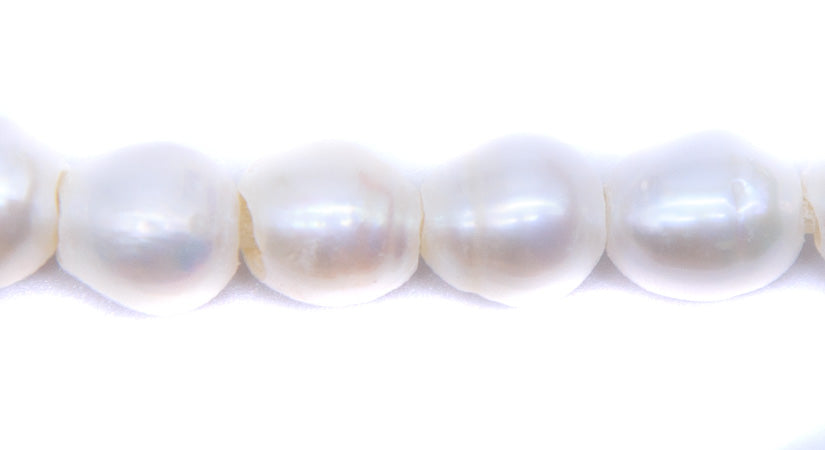 FP095-LH31: Freshwater Pearl Barrel White 7x9mm avg 2.5mm Hole