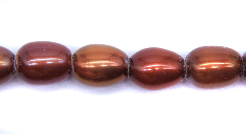 FP095-LH34: Freshwater Pearl Copper Oval 7x9mm Avg 2.5mm Hole