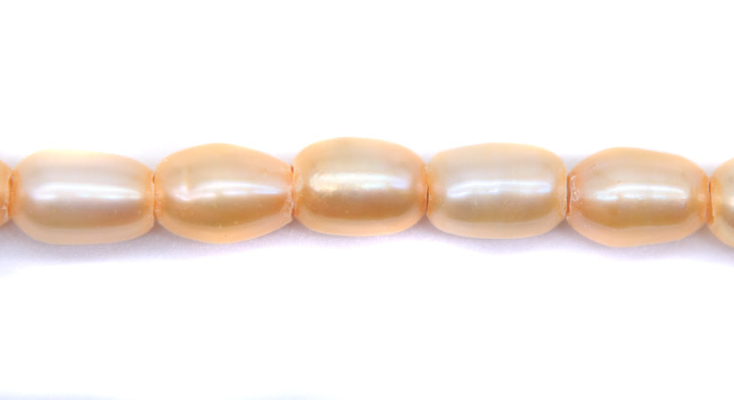 FP095-LH35: Freshwater Pearl Peach Oval 6.5x9mm avg 2.5mm hole