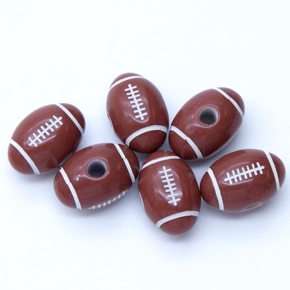 PL204: Acrylic Football/Rugby Ball 12x19mm 300Pc