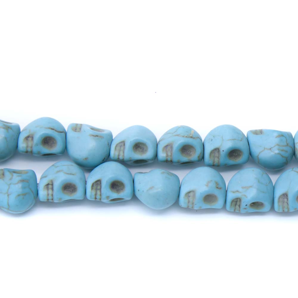 2ST50-B: Skull Magnesite Turquoise Blue 8x10mm