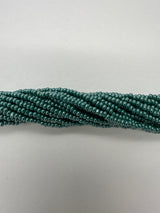 11SB386-CR: CZ Seed Bead True Cut Sfinx DK Green 11/0 1HK