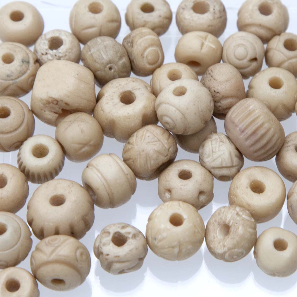 BN125-2CMX: Bone Round Carved Mix Antique 10-15mm 50 Grams