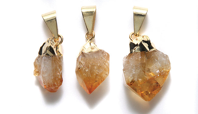 ST25-58G: Brazil Citrine Point Gold 22-30mm 1 Piece